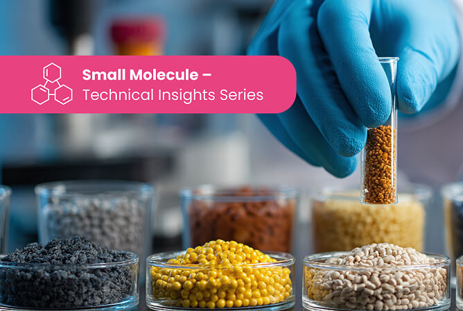 Blue gloved hand with an array of petri dishes filled with different substances